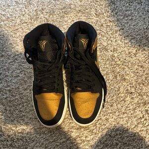 Jordan Black and Gold Athletic Shoes